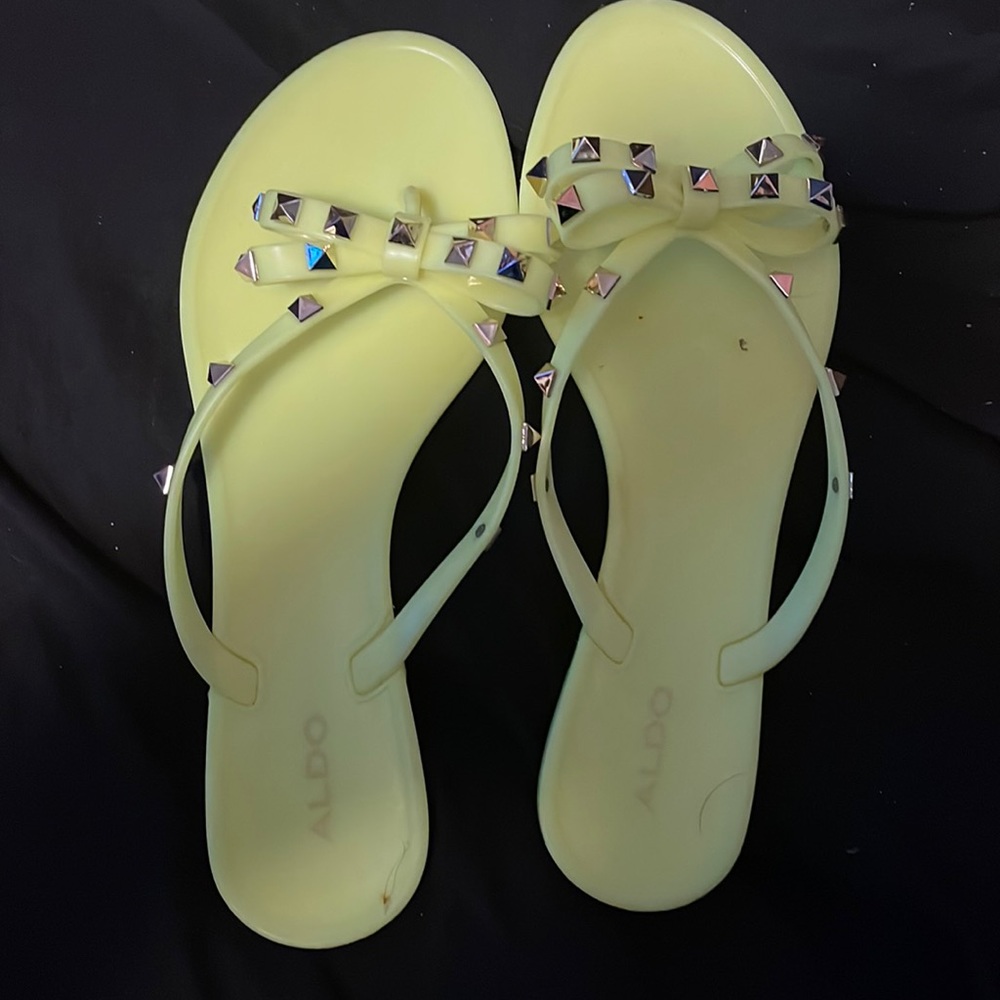 Neon green flip flops
